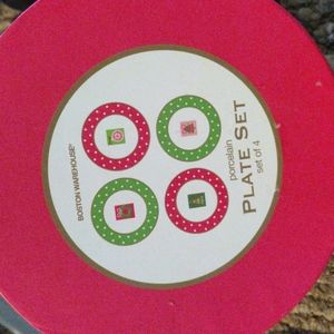 Porcelain small set of 4 holiday plates.